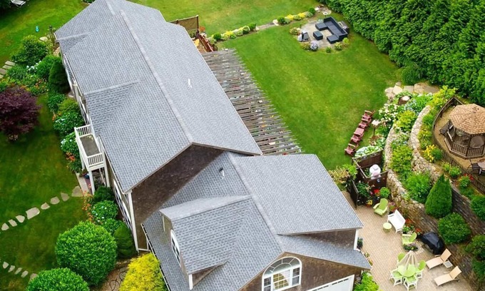 Oak Bluffs Haus | Beautiful Estate with salt water pool & pond with kayaks