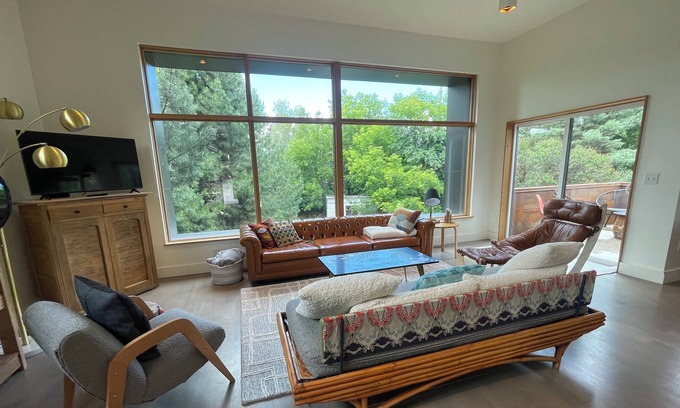 Riverfront Haus | Best location! Fenced yard, steps to waterfront, beautiful. Dog friendly.