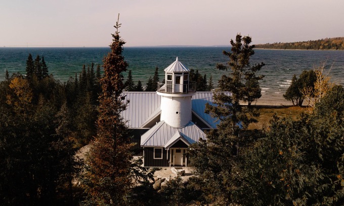 Straits of Mackinac Haus | Bois Blanc Island Lighthouse Home. Iconic Sunset Views of the Mackinac Bridge!