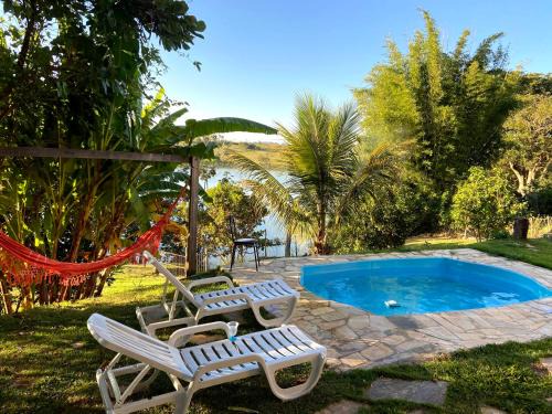 Ijaci Haus | Casa com piscina fundo pra represa e AR Condicionado CasinhaBrancaDeVaranda