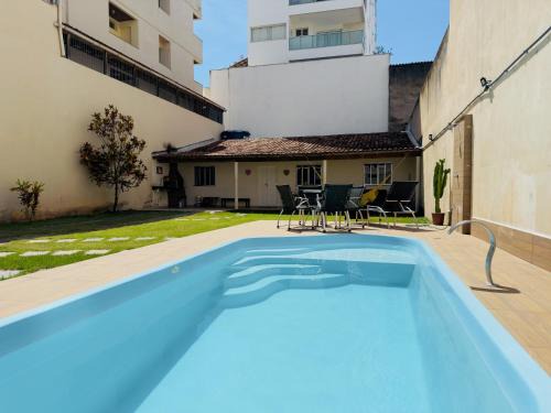 Praia do Morro Wohnung | Casa de Praia com Piscina e Churrasqueira a 280m da Praia do Morro - 3 quartos com Ar Condicionado, sendo 2 suítes- Quintal amplo, ideal para famílias