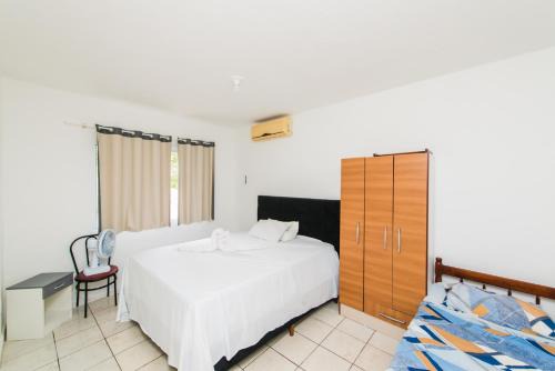 Palhoca Haus | Casa Espaçosa com quintal interno