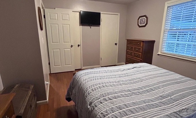 Mountain City Haus | Charming 3-bedroom house in Mountain City beautiful big coy pond in backyard