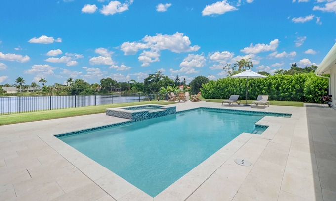 Palm River Estates Haus | Pristine Lake Home, Heated Pool, Gas Fire Pit, Fenced Yard