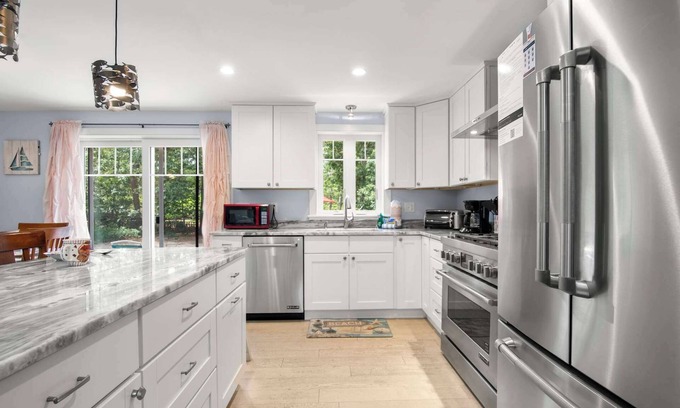 Eastham Haus | Charming Getaway with Hot Tub, Dog Friendly!