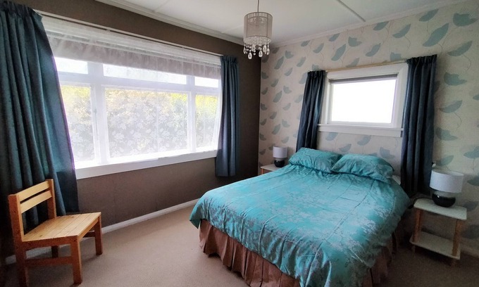 Otaki Haus | Classic Kiwi Bach at Otaki Beach. Pet and Family Friendly!