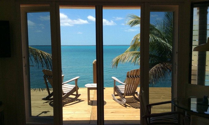 Green Turtle Cay Hütte | Coco Nut Tree House liegt in tropisches Laub auf das kristallklare Meer von Abaco gelegen