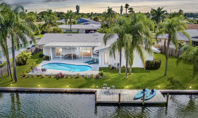 Venetian Way Haus | Cocoa Beach Coral Retreat waterfront 3 BR /2.5 BA