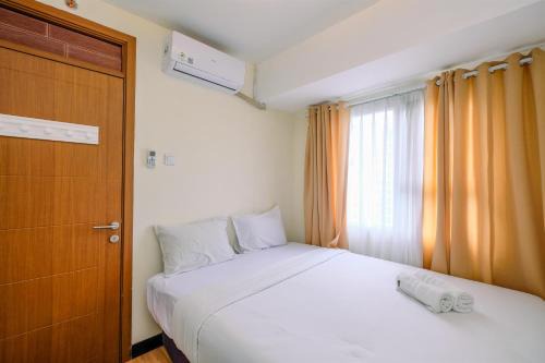 Depok Wohnung | Comfortable and Tidy 2BR at Cinere Resort Apartment By Travelio