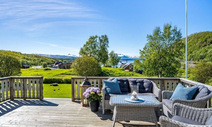 Tverlandet Haus | Countryside Holiday Home in Norwegian Fjord with Mountain Views & Serene Gardens