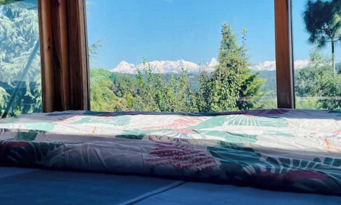 Almora Haus | Cozy bungalow nestled in the Himalayas, snow-capped peaks, Kumaoni culture.