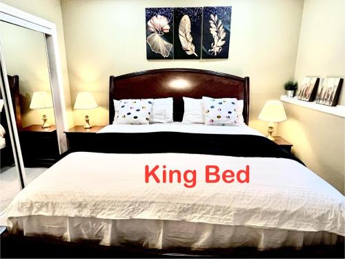 Southwest Calgary Haus | Cozy Walkout suite with King bed, Kitchen, Parking & Patio