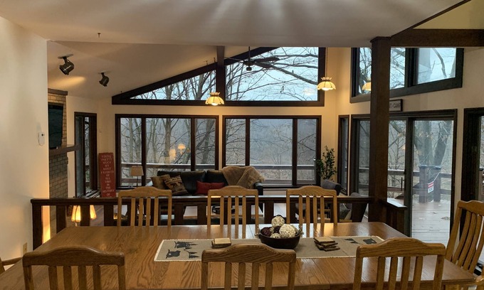 Conneaut Haus | Creek side retreat and breathtaking views! Moments from hunting and fishing!