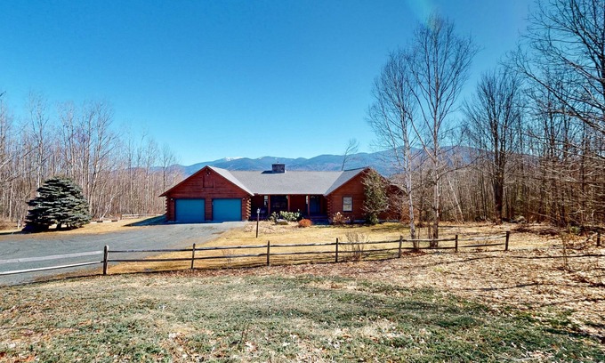 Easton Haus | Custom log home with wood stove, games, generous deck, & stunning mountain views