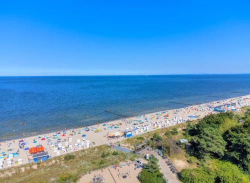 Ueckeritz Wohnung | Dünenhäuser Ückeritz UnserUsedomDe FeWo ca80qm mit privater Sauna und Kamin Parkplatz direkt am Strand 9I3