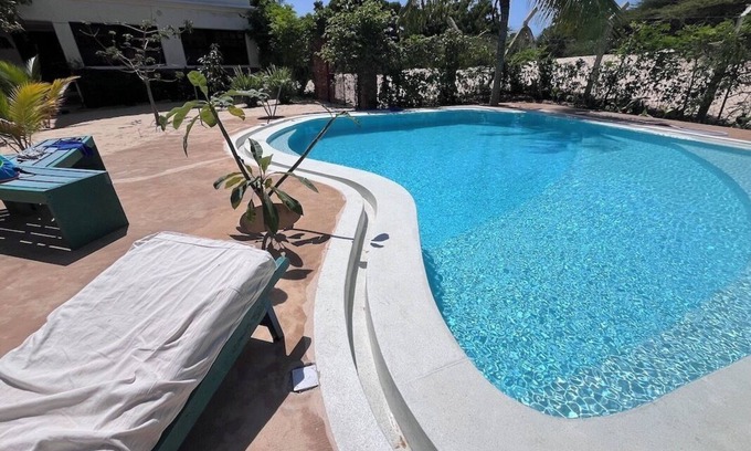 Lamu Villa | Dive in to our pool and feel the breeze at Mbibo House in the Shela sand dunes
