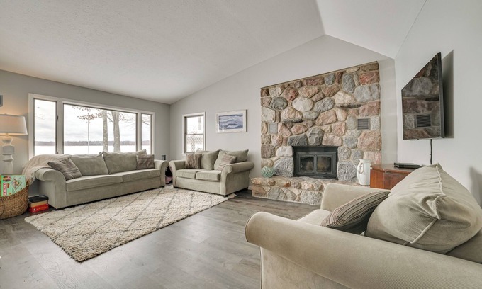 Cadillac Haus | Dock & Views: Lake Mitchell Home in Cadillac!