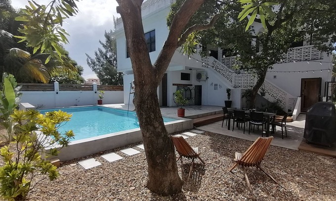 Dangriga Haus | Downtown Dangriga. Entire property. Private pool. Sleeps 20. Handicap Accessible