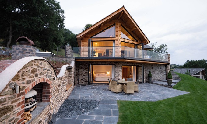 Montgomery Haus | Eithriadol Maldwyn is a collection of luxury countryside homes with a sauna and hot tubs. Pet friendly with electric car chargers, sleeping 16.