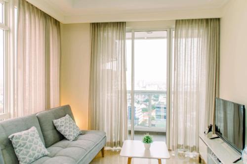 Cikini Wohnung | Elegant and Restful 2BR at Menteng Park Apartment By Travelio