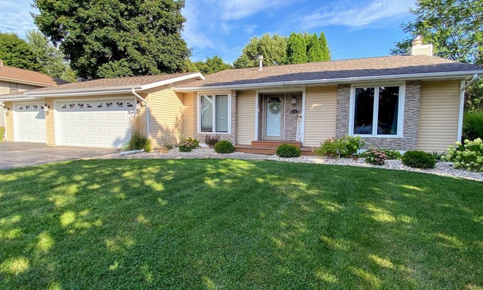 Loves Park Haus | Elegant, charming, serene, & delightful home with huge fenced yard close to I90!