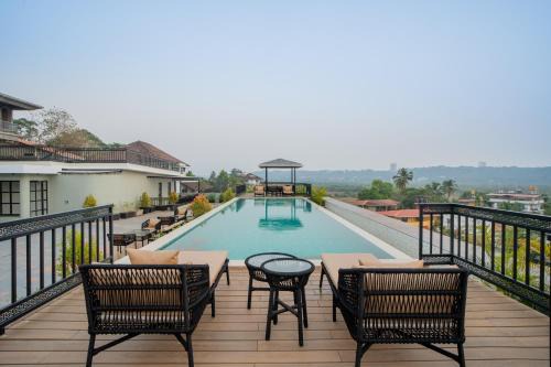 Saipem Wohnung | ELIVAAS 1 BHK with Rooftop Pool - Kamerios Verano