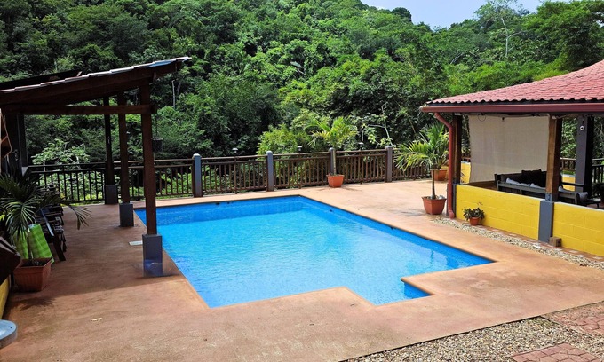 San Ignacio Haus | Enchanting Riverside Jungle Village Bungalow: Pool, A/C, WiFi, TV, Kayaks & More