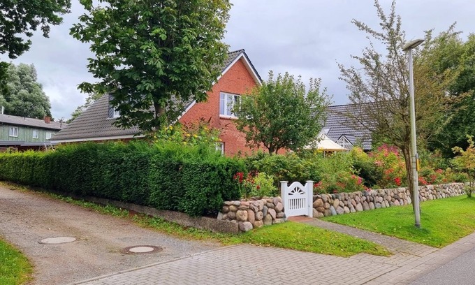 Hattstedt Wohnung | Beenden Sie den Tag, bei einem Glas Wein und genießen Sie den Sonnenuntergang.