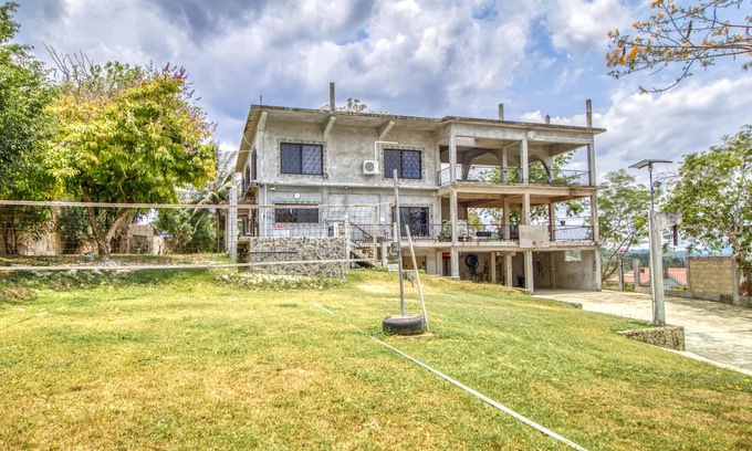 Santa Elena Haus | Family Estate with High-Speed WiFi, Private Pool, Basketball, Office, & Patio