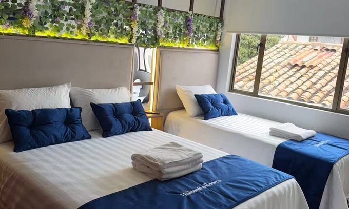 Usaquen Hotel | Family room boutique hotel Unicentro