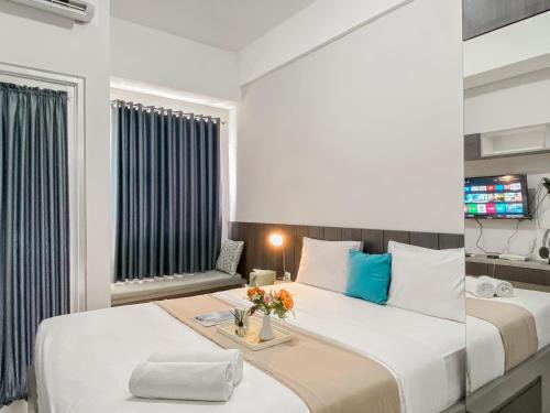 Bekasi Timur Wohnung | Good and Warm Studio at Transpark Juanda Bekasi Timur Apartment By Travelio