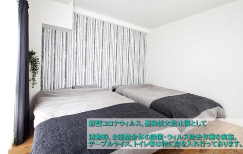 Nishi Ward Wohnung | Guest House Re-worth Joshin1 4F