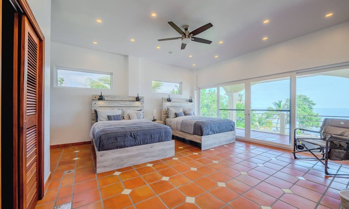 Sittee River Haus | Hawkz House Unit 2: Oceanfront 3-bedroom House with pool,AC, and wifi