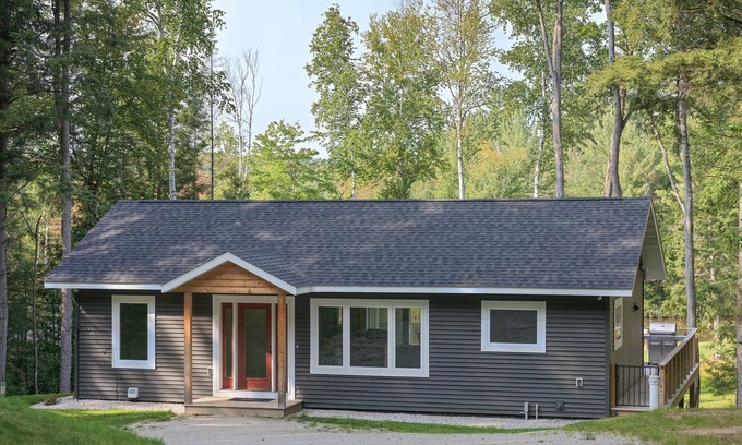 Wetmore Haus | Hiawatha Snowd Inn – Modern Lakefront Retreat | Dock Firepit A/C