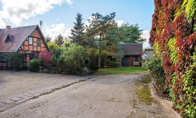 Verchen Haus | Ferienhaus 'Blockbohlen-Haus Auf Hof Verchen' mit privater Terrasse, privatem Garten und Wi-Fi