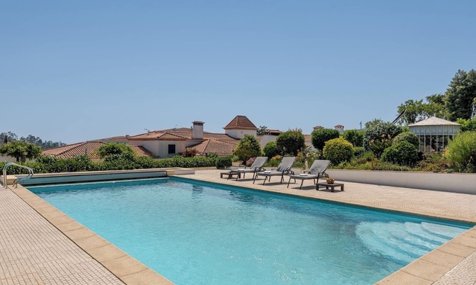 Paredes Haus | HostWise - Modern Comfort and Shared Pool in Paredes