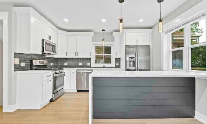 Chester Highlands Haus | House with garage, outdoor dining and basement bar