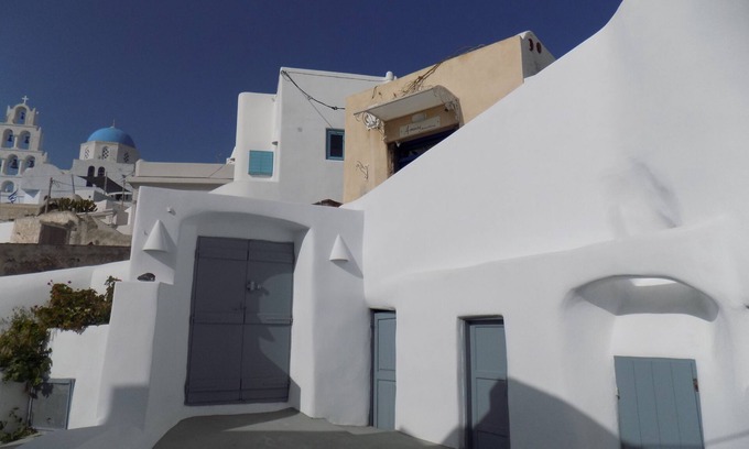 Pyrgos Haus | Imarkellis Pyrgos Traditional House and Belfry Charm with Courtyard in Santorini