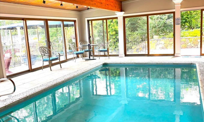 Eastport Haus | Indoor/Outdoor waterfront oasis with indoor heated pool awaits you in Eastport!