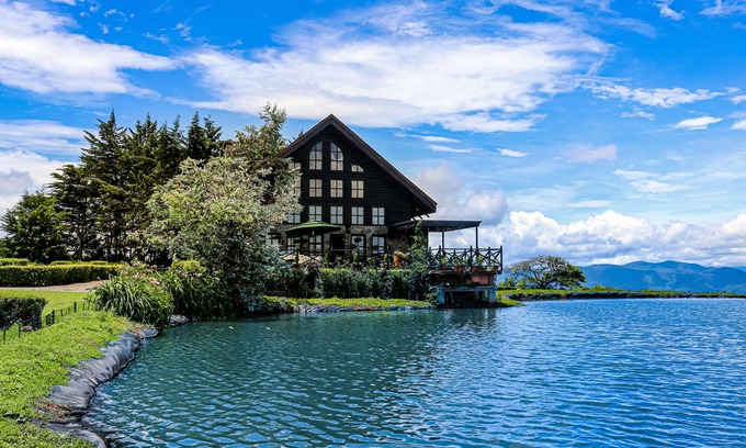 San Rafael Haus | Inviting dog-friendly home with lake, hot tub, game room, fireplace, & W/D