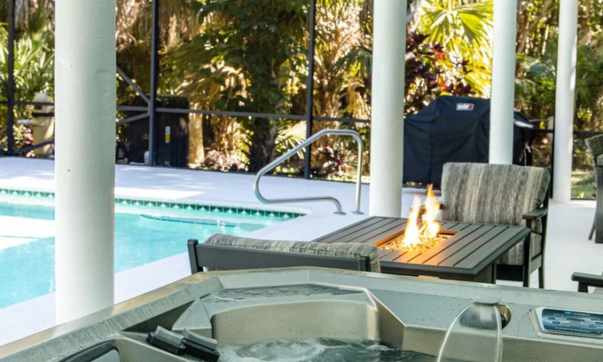 Jupiter Farms Haus | Jupiter. 2.5 serene and private acres. Surrounded by tropical landscaping.