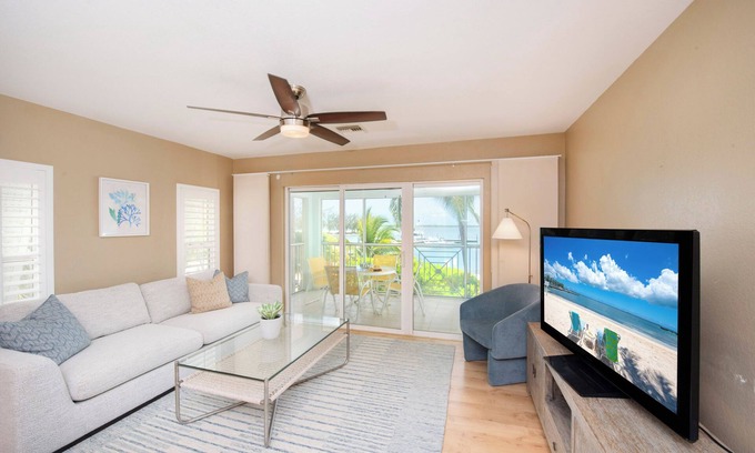 Rum Point Haus | Kaibo Escape: Waterfront Condo w/Communal Pool & Hot Tub, Walk to Restaurants & Starfish Point