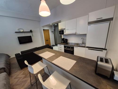 Ylamylly Wohnung | Laadukas asunto ydinkeskustasta omalla autopaikalla