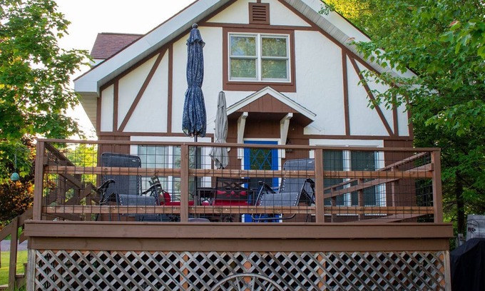 Chassell Haus | Lake House with private sandy beach.