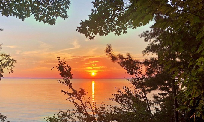 Ellsworth Haus | Lake Michigan Sunsets and sandy beachfront home on Grand Traverse Bay
