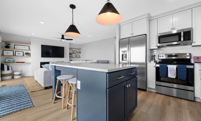 Cadillac Haus | Lake Mitchell Lakefront Retreat. Family-Friendly home to fish, swim, or ski!