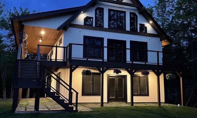 Lochmere Haus | Lake Winnisquam. Large lake view home with beach access. Sleeps 14-16.