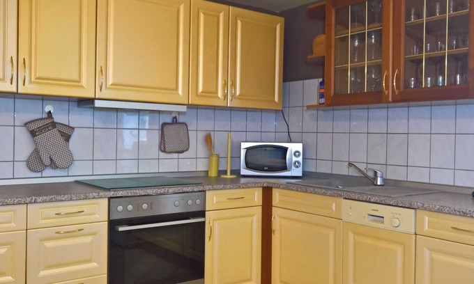 Trollenhagen Wohnung | Große Ferienwohnung mit Garten - Ferienwohnung