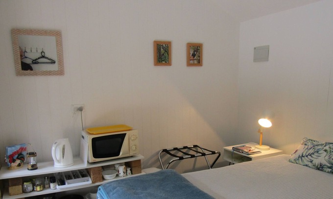 Kaipara Flats Kabine | Looking for a glamping experience with a difference? Try the Magnolia Room.