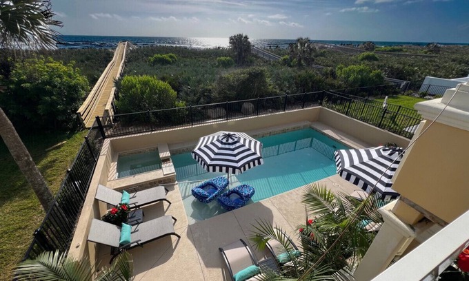 Palm Coast Haus | Luxury Oceanfront Oasis: 4BR Cinnamon Beach Bliss with Pool & Balconies